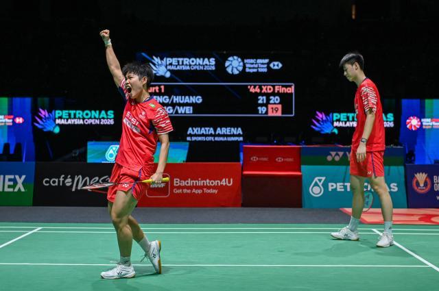 1768127226351047026.jpg (体育)(10)羽毛球——马来西亚公开赛:冯彦哲_黄东萍混双夺冠XxjpseC000222_20260111_PEPFN0A001.jpg